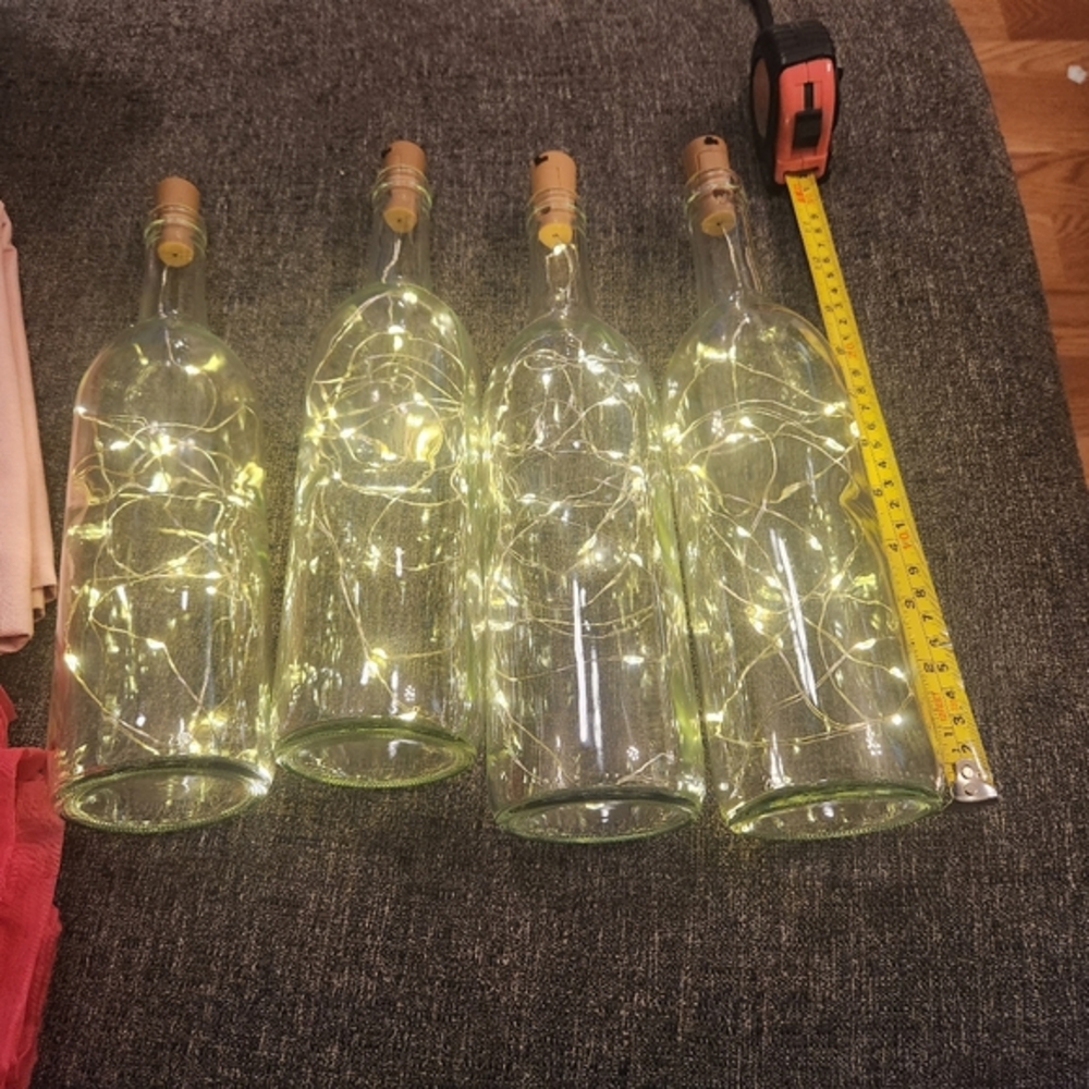 Lot of 3 wine bottles with fairy lights